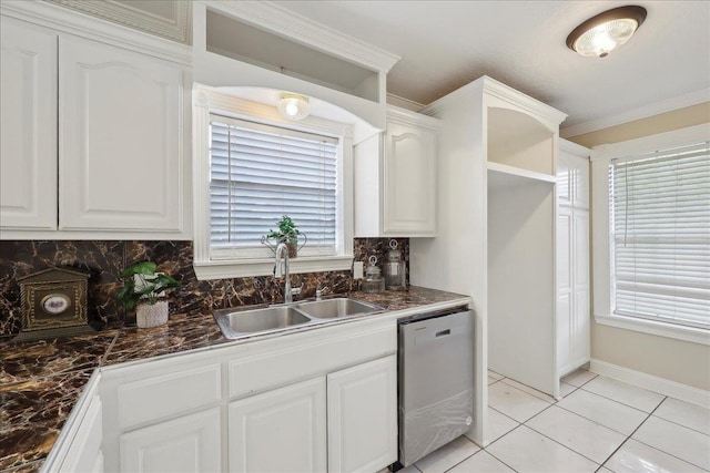 5210 Ada Ave, Beaumont, TX 77708 - kitchen with dishwasher, a sink, dark countertops, tasteful backsplash, and crown molding