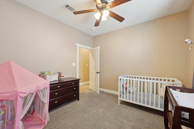 bedroom featuring carpet flooring, a ceiling fan, and baseboards