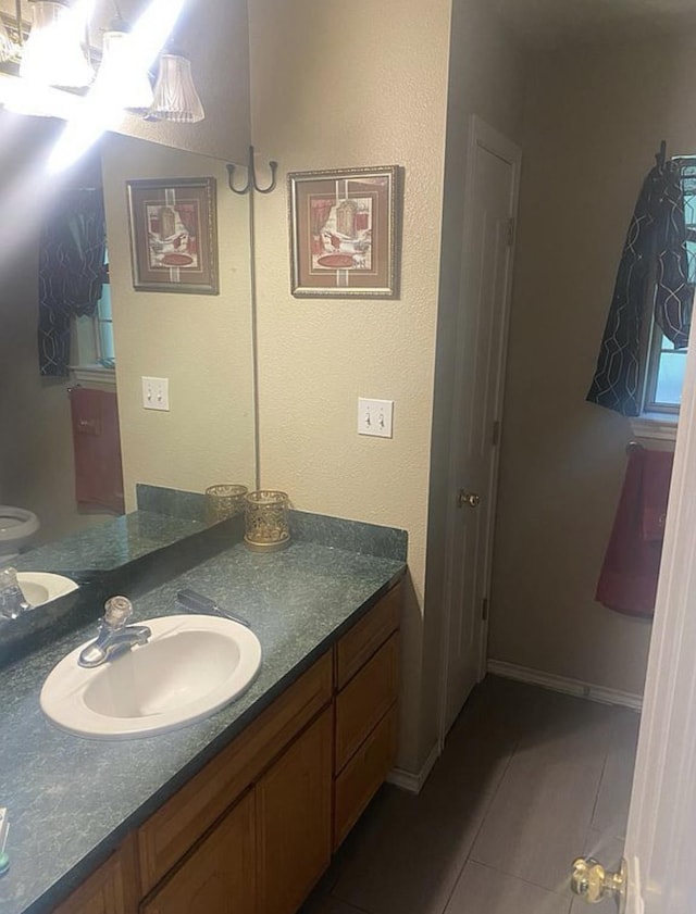 bathroom featuring vanity and tile patterned floors