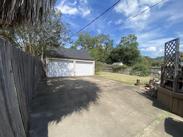 garage featuring a yard