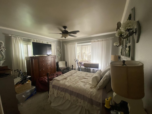 bedroom featuring ceiling fan and ornamental molding