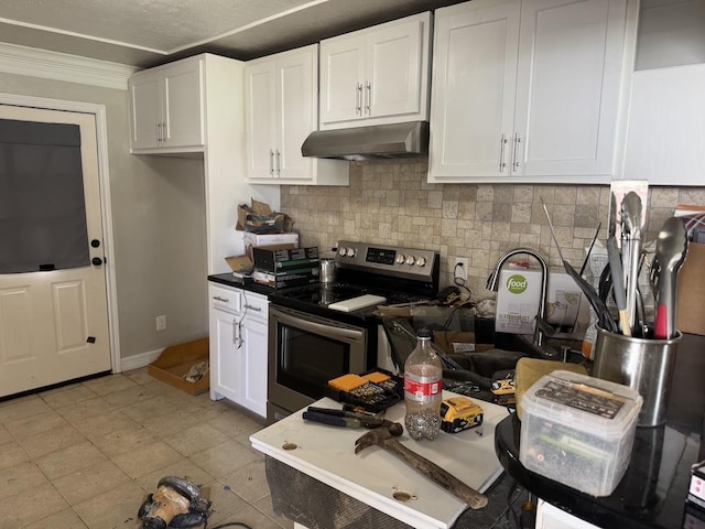 kitchen with under cabinet range hood, backsplash, white cabinetry, and stainless steel electric stove