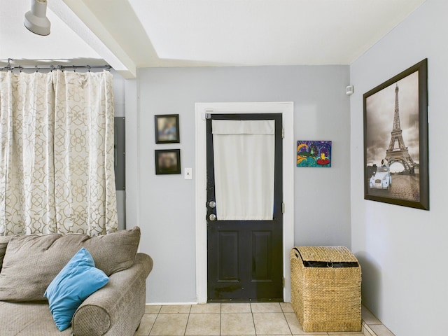 entryway featuring light tile patterned floors