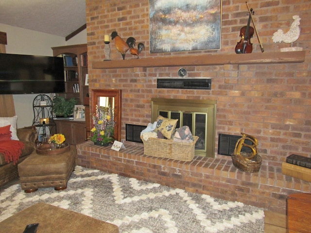 living room with a fireplace and vaulted ceiling