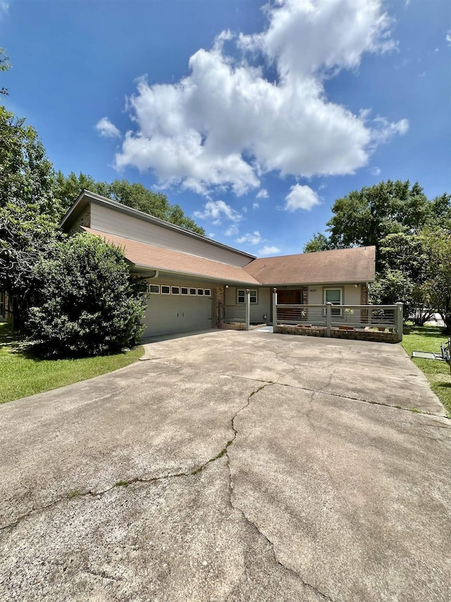 single story home with a garage