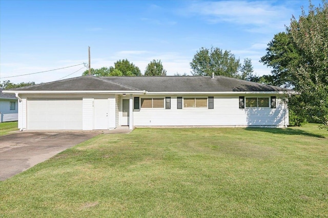 single story home featuring a garage and a front yard