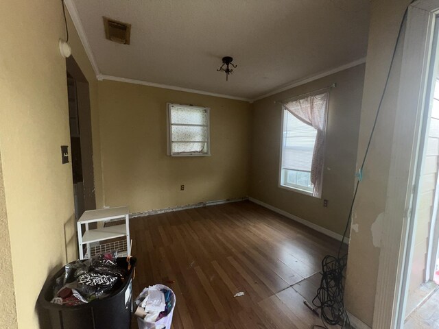 2007 Queen Ave, Nederland, TX 77627 - unfurnished room with crown molding and wood finished floors
