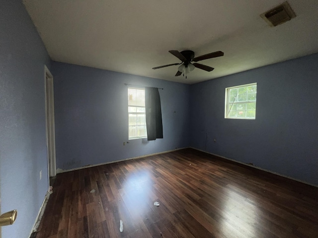 2007 Queen Ave, Nederland, TX 77627 - spare room with dark wood-style flooring and ceiling fan