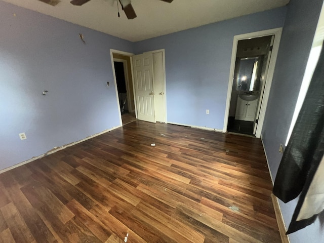 2007 Queen Ave, Nederland, TX 77627 - unfurnished bedroom with wood finished floors, ensuite bath, and a ceiling fan