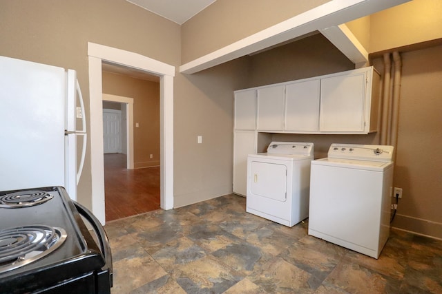 clothes washing area featuring washing machine and clothes dryer