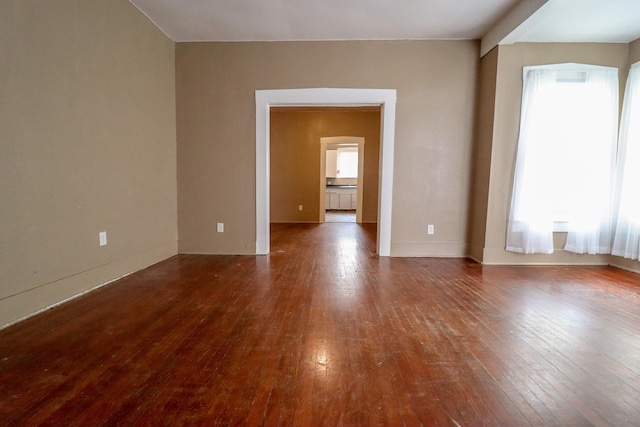 empty room featuring wood-type flooring