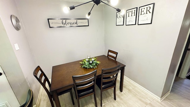 3575 Cecil Dr, Beaumont, TX 77706 - dining room featuring light tile patterned floors