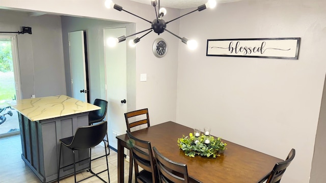 3575 Cecil Dr, Beaumont, TX 77706 - dining area featuring a chandelier