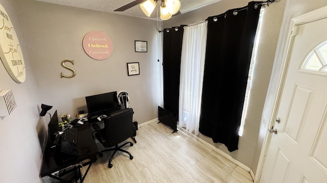 3575 Cecil Dr, Beaumont, TX 77706 - office with a ceiling fan and baseboards