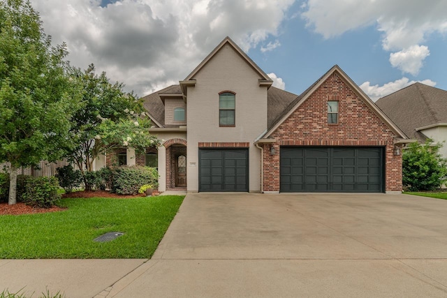 6570 Merrick Ln, Beaumont, TX 77706 - view of front facade with brick siding, driveway, and a front lawn
