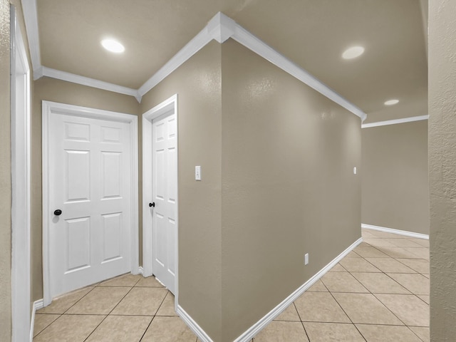 9570 Cumberland Dr, Beaumont, TX 77708 - corridor featuring light tile patterned flooring, crown molding, recessed lighting, and a textured wall