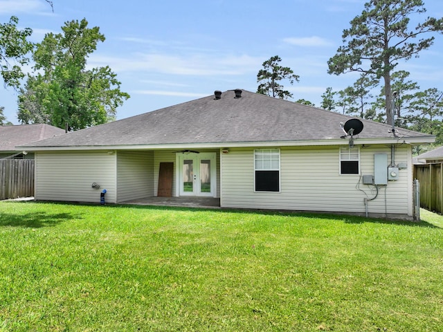 9570 Cumberland Dr, Beaumont, TX 77708 - rear view of property with french doors and roof with shingles