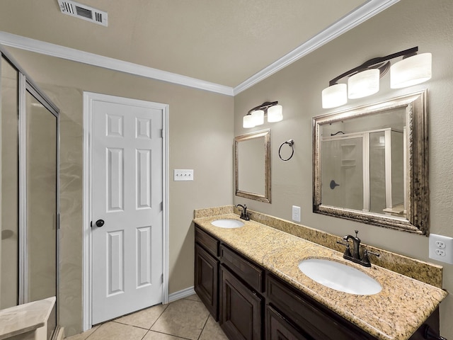 9570 Cumberland Dr, Beaumont, TX 77708 - bathroom featuring tile patterned floors, double vanity, ornamental molding, and a shower with shower door
