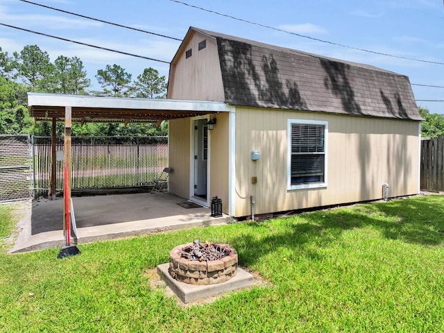 9570 Cumberland Dr, Beaumont, TX 77708 - view of outbuilding featuring a fire pit