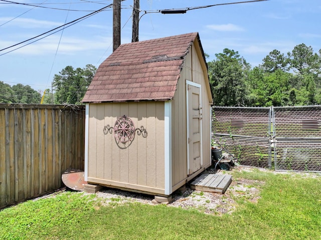 9570 Cumberland Dr, Beaumont, TX 77708 - view of shed with a fenced backyard