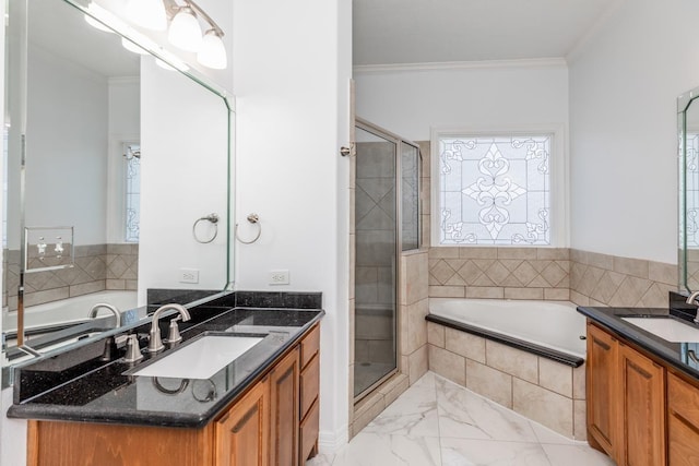 full bathroom featuring ornamental molding, a stall shower, a sink, and a bath