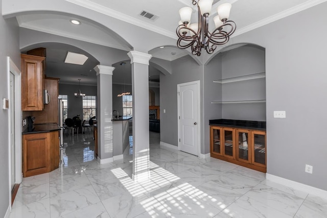 interior space with marble finish floor, visible vents, ornamental molding, a chandelier, and baseboards