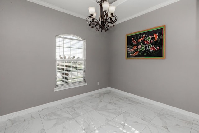 empty room featuring ornamental molding, marble finish floor, and baseboards