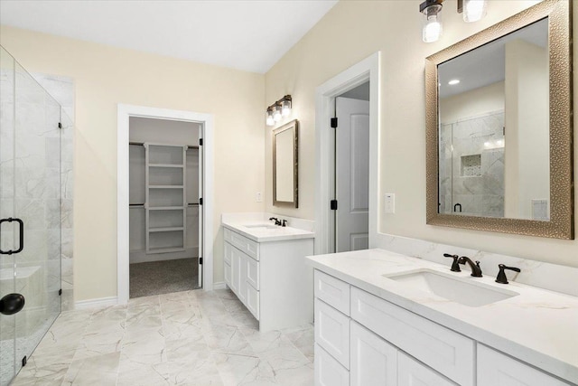 bathroom featuring walk in shower and vanity