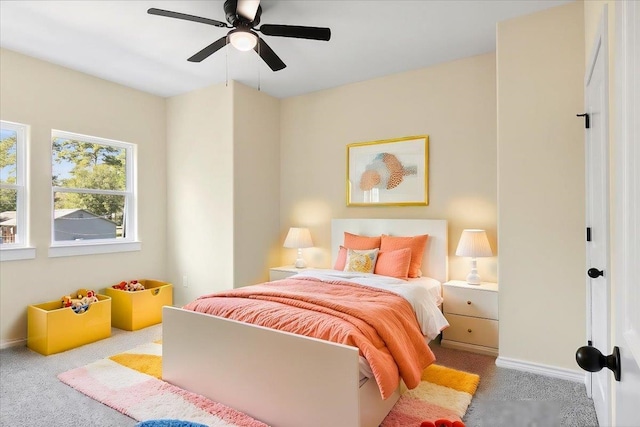 bedroom featuring light carpet and ceiling fan