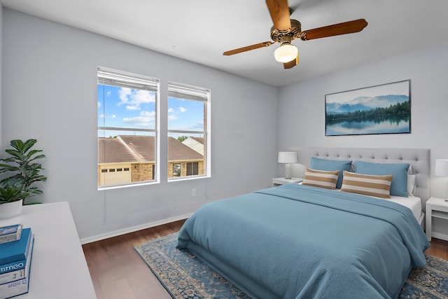1003 Park Mdw, Beaumont, TX 77706 - bedroom featuring wood finished floors, baseboards, and ceiling fan