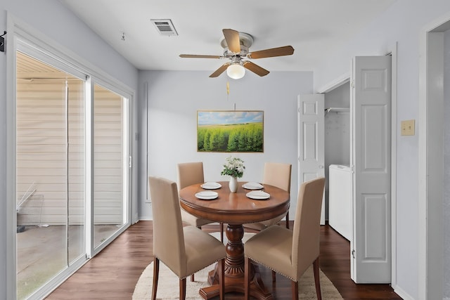 1003 Park Mdw, Beaumont, TX 77706 - dining area with ceiling fan, wood finished floors, and washer / dryer