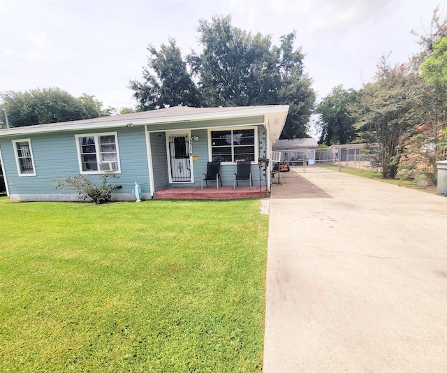2210 Nora St, Beaumont, TX 77705 - view of front facade featuring concrete driveway and a porch