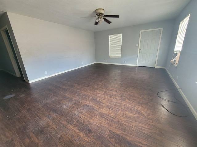 2210 Nora St, Beaumont, TX 77705 - empty room with a ceiling fan and dark wood finished floors