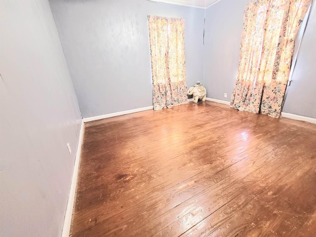 2210 Nora St, Beaumont, TX 77705 - empty room featuring wood-type flooring and baseboards