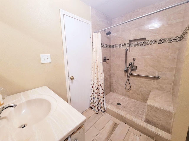 2210 Nora St, Beaumont, TX 77705 - bathroom with a tile shower and vanity