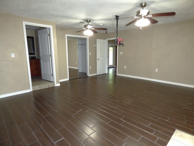 5335 Idylwood St, Beaumont, TX 77703 - unfurnished living room with a ceiling fan, wood finished floors, and baseboards