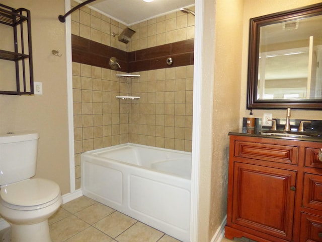 5335 Idylwood St, Beaumont, TX 77703 - full bath with toilet, tile patterned floors, vanity, bathing tub / shower combination, and baseboards