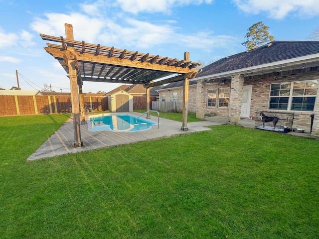 479 Reynolds Ln, Vidor, TX 77662 - view of yard featuring an outbuilding, a patio area, a fenced backyard, a storage unit, and a pergola