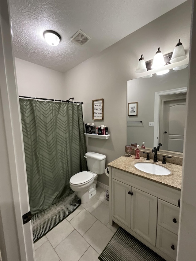 479 Reynolds Ln, Vidor, TX 77662 - bathroom with visible vents, tile patterned flooring, vanity, toilet, and a shower with curtain