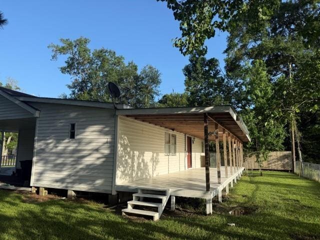 1445 Bahama Dr, Vidor, TX 77662 - view of home's exterior featuring a wooden deck
