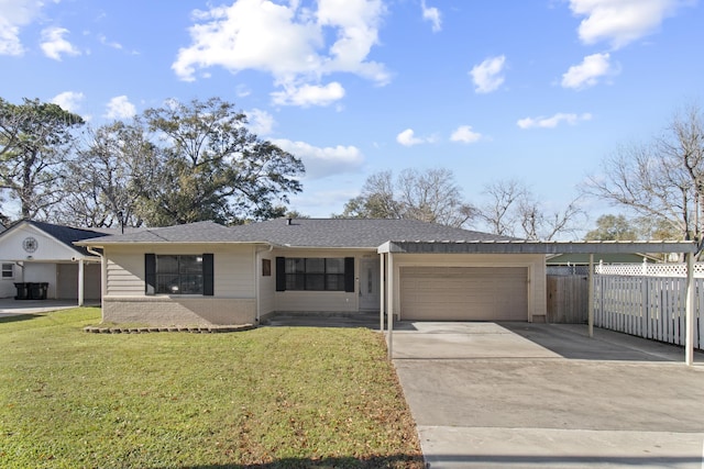 ranch-style home featuring a front lawn and a garage