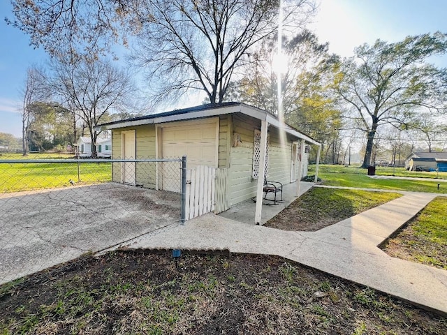 view of outdoor structure with fence