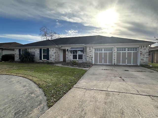 637 Ridgewood Dr, Port Neches, TX 77651 - ranch-style home featuring concrete driveway, a front yard, and an attached garage