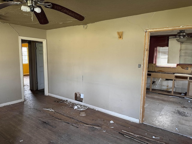 unfurnished room with ceiling fan