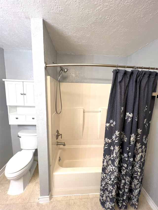 bathroom with tile patterned flooring, shower / tub combo, a textured ceiling, and toilet