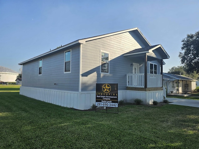 view of property exterior featuring a yard