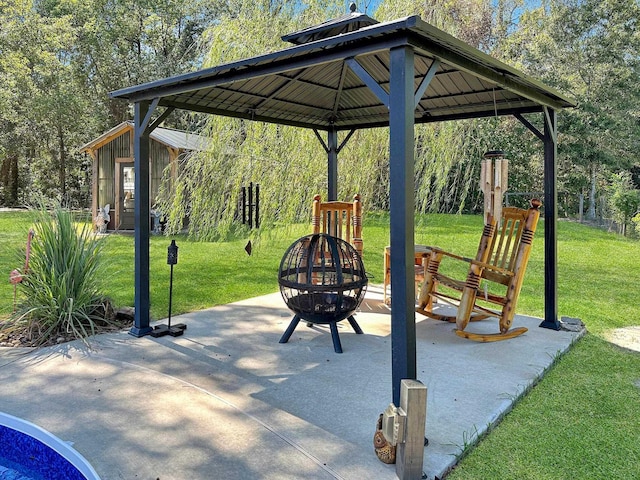 view of patio / terrace with a gazebo and an outdoor fire pit