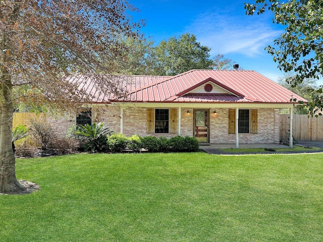 view of front of property with a porch and a front lawn