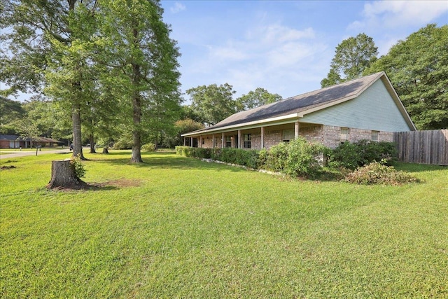 132 County Road 760, Buna, TX 77612 - view of yard with fence