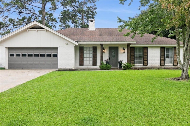 ranch-style home featuring a garage and a front yard